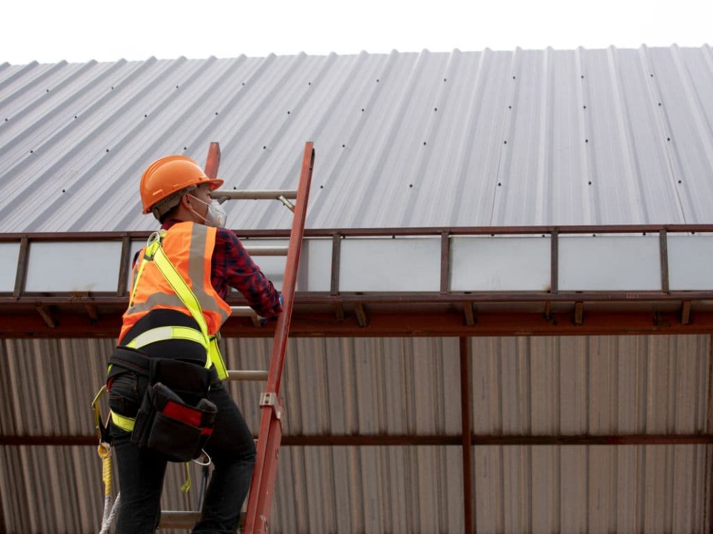 Photo of Roofer Installing Metal Roof in Jacksonville